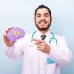 Doctor neurologist hand show brain human figure.